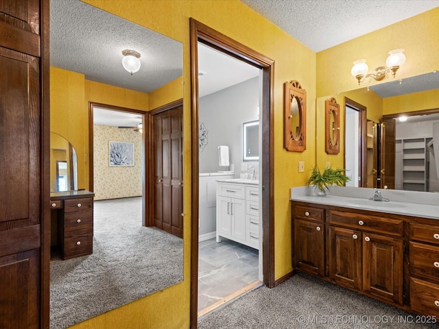 639 Oakridge Dr, Bartlesville, OK 74006 - full bath with a textured ceiling and two vanities