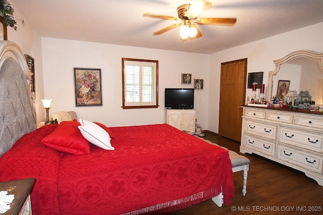 990 Turney Ave, Tahlequah, OK 74464 - bedroom featuring dark wood-style flooring and a ceiling fan