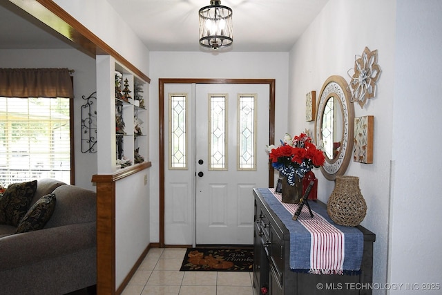 990 Turney Ave, Tahlequah, OK 74464 - foyer entrance with light tile patterned floors and a chandelier
