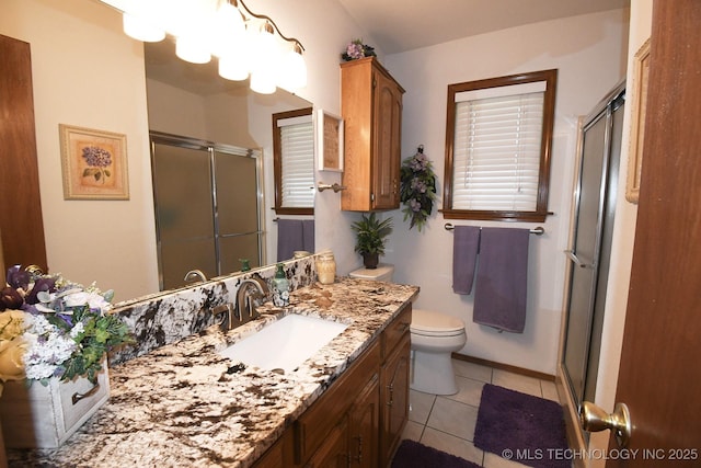 990 Turney Ave, Tahlequah, OK 74464 - bathroom with a shower stall, vanity, and tile patterned flooring