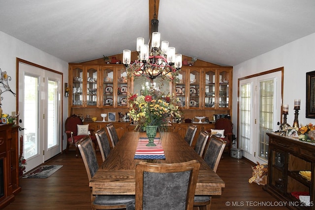990 Turney Ave, Tahlequah, OK 74464 - dining area with vaulted ceiling, a chandelier, dark wood finished floors, and healthy amount of natural light