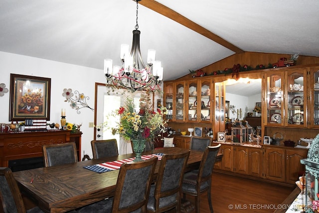 990 Turney Ave, Tahlequah, OK 74464 - dining area featuring a chandelier, lofted ceiling, and dark wood-type flooring