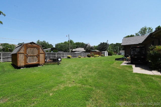 990 Turney Ave, Tahlequah, OK 74464 - fenced backyard featuring a storage unit