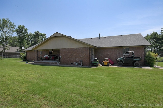 990 Turney Ave, Tahlequah, OK 74464 - rear view of property featuring brick siding and a patio
