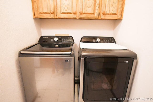 990 Turney Ave, Tahlequah, OK 74464 - laundry room with cabinet space and separate washer and dryer