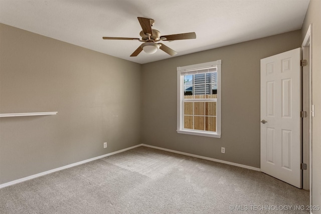 3713 S Poplar Ave, Broken Arrow, OK 74011 - carpeted spare room featuring ceiling fan and baseboards