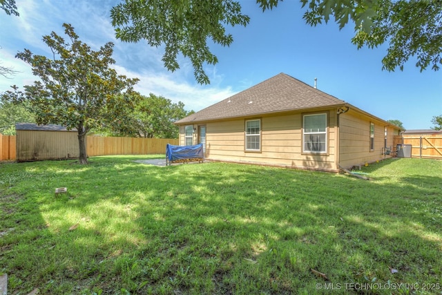 3713 S Poplar Ave, Broken Arrow, OK 74011 - back of house featuring central air condition unit and roof with shingles