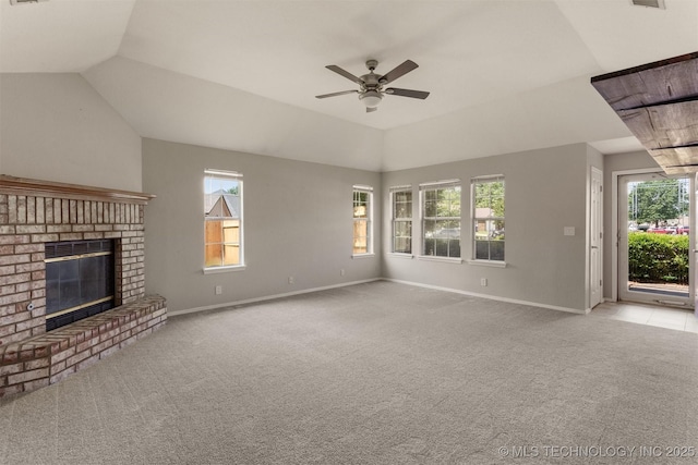 3713 S Poplar Ave, Broken Arrow, OK 74011 - unfurnished living room featuring a ceiling fan, healthy amount of natural light, baseboards, and lofted ceiling