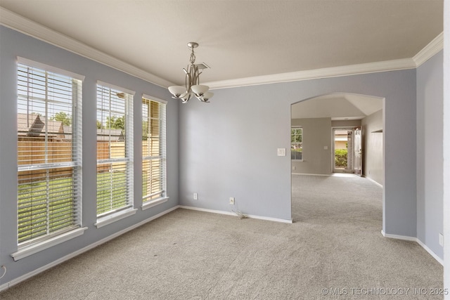 3713 S Poplar Ave, Broken Arrow, OK 74011 - spare room with ornamental molding, carpet flooring, arched walkways, a chandelier, and baseboards