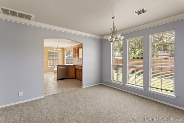 3713 S Poplar Ave, Broken Arrow, OK 74011 - unfurnished dining area featuring a chandelier, crown molding, arched walkways, light colored carpet, and baseboards