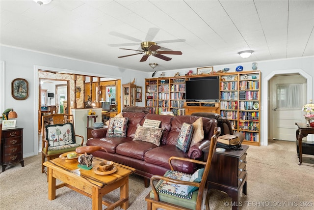 800 N Hwy 10, Gore, OK 74435 - living area featuring carpet, ceiling fan, and ornamental molding