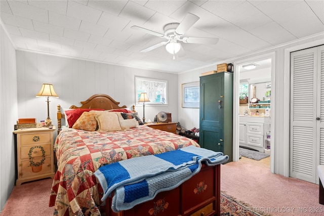 800 N Hwy 10, Gore, OK 74435 - bedroom with carpet, connected bathroom, and ceiling fan