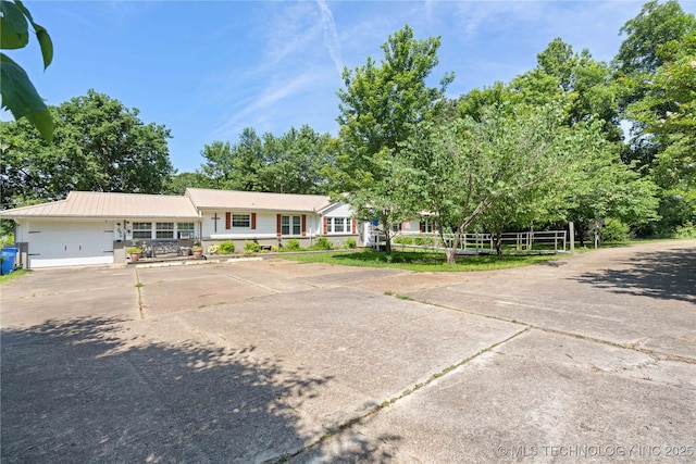 800 N Hwy 10, Gore, OK 74435 - view of front of property featuring an attached garage and metal roof