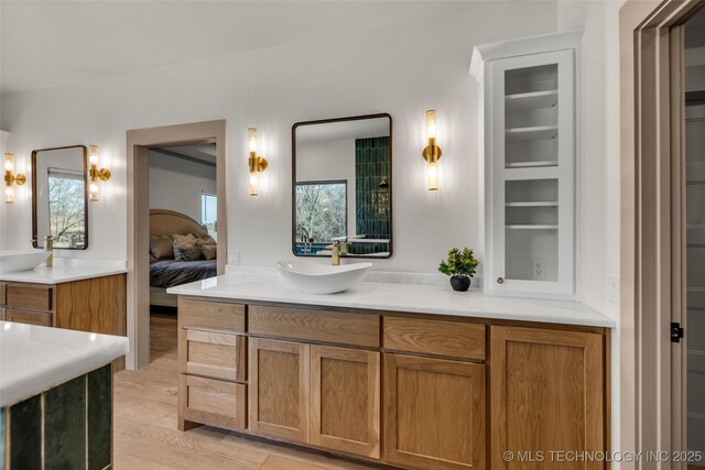 35795 E 231st St S, Porter, OK 74454 - full bathroom featuring vanity, ensuite bath, and wood finished floors