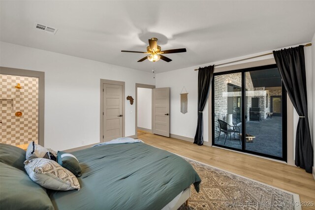 35795 E 231st St S, Porter, OK 74454 - bedroom featuring light wood-style flooring, access to exterior, a ceiling fan, baseboards, and ensuite bathroom