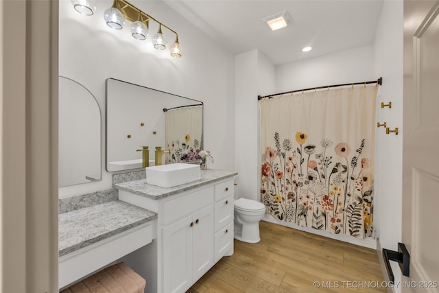 35795 E 231st St S, Porter, OK 74454 - bathroom featuring wood finished floors, vanity, toilet, a shower with shower curtain, and recessed lighting