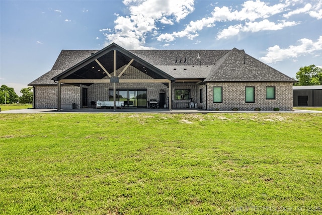 35795 E 231st St S, Porter, OK 74454 - rear view of property with brick siding, a yard, a shingled roof, and a patio area
