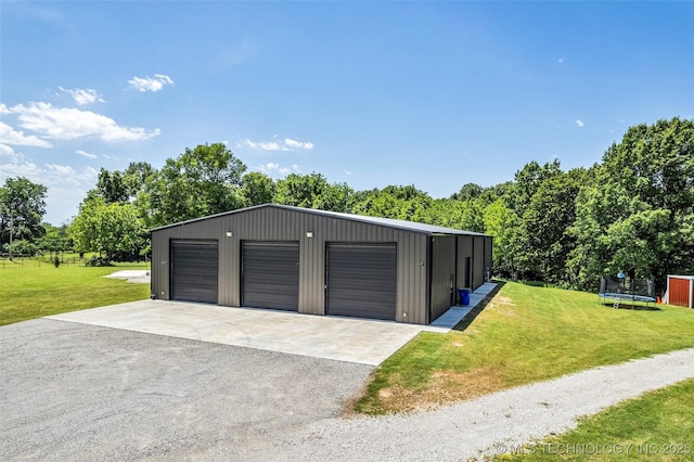 35795 E 231st St S, Porter, OK 74454 - detached garage with a trampoline