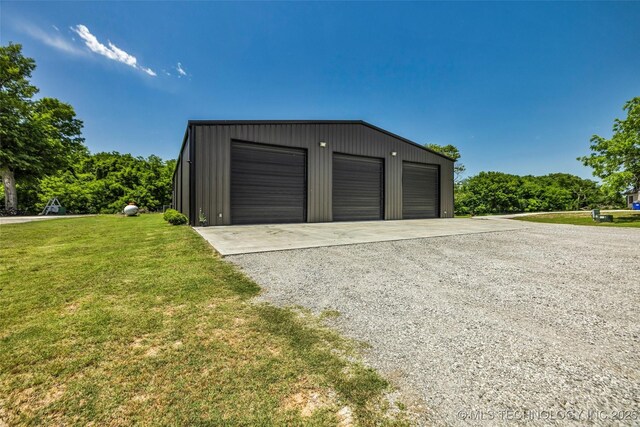 35795 E 231st St S, Porter, OK 74454 - detached garage featuring driveway