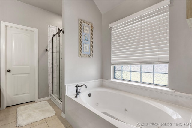 6801 N 128th Ct E, Owasso, OK 74055 - full bath featuring a stall shower, a tub with jets, tile patterned floors, and lofted ceiling