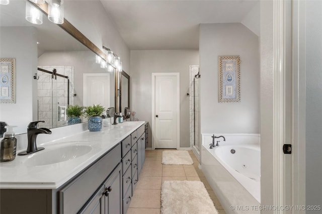 6801 N 128th Ct E, Owasso, OK 74055 - full bathroom with a stall shower, double vanity, a tub with jets, and tile patterned floors
