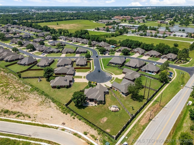 6801 N 128th Ct E, Owasso, OK 74055 - aerial view of property and surrounding area featuring nearby suburban area and a large body of water