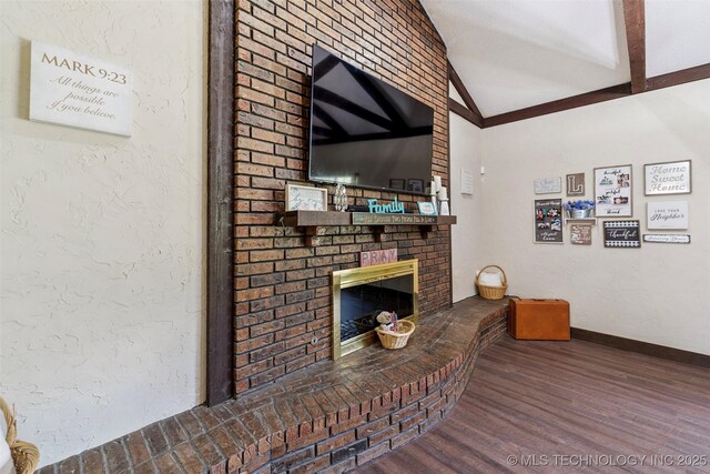 22547 S Dogwood Ct, Claremore, OK 74019 - living area featuring a brick fireplace, wood finished floors, and lofted ceiling