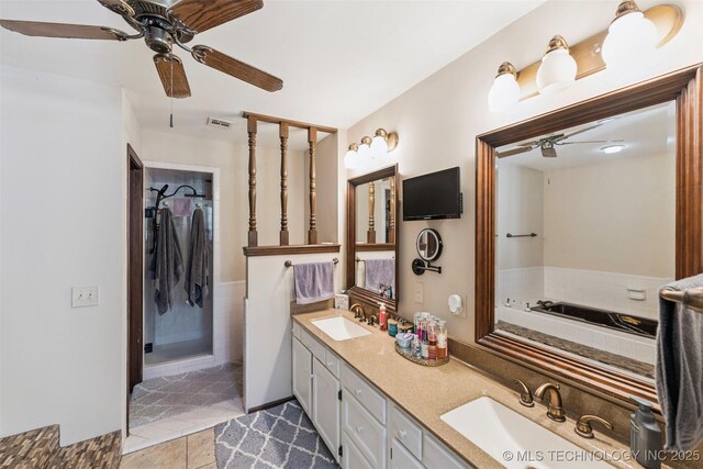 22547 S Dogwood Ct, Claremore, OK 74019 - full bathroom with double vanity, a ceiling fan, and tile patterned flooring