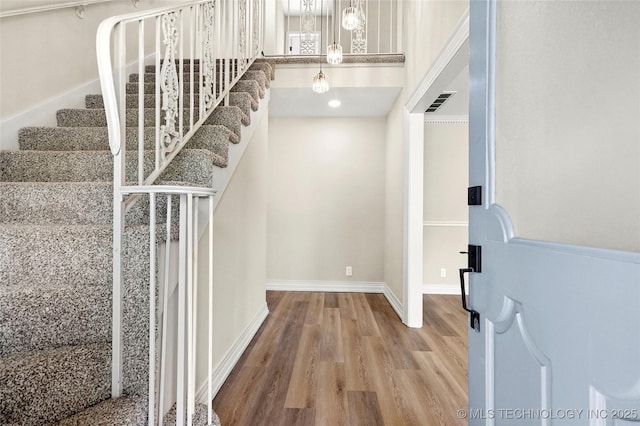 6722 S 72nd E Ave, Tulsa, OK 74133 - staircase featuring wood finished floors and baseboards