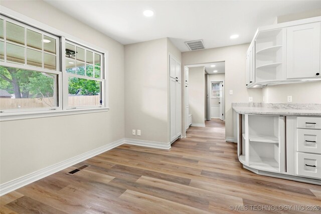 6722 S 72nd E Ave, Tulsa, OK 74133 - kitchen featuring open shelves, white cabinetry, light wood finished floors, baseboards, and recessed lighting