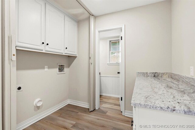 6722 S 72nd E Ave, Tulsa, OK 74133 - laundry room featuring light wood finished floors, washer hookup, electric dryer hookup, cabinet space, and baseboards
