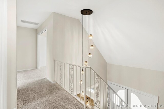 6722 S 72nd E Ave, Tulsa, OK 74133 - hallway featuring an upstairs landing and carpet flooring
