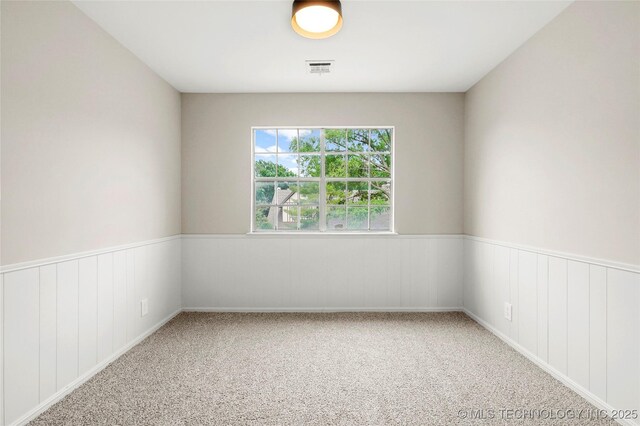 6722 S 72nd E Ave, Tulsa, OK 74133 - empty room featuring carpet floors and wainscoting
