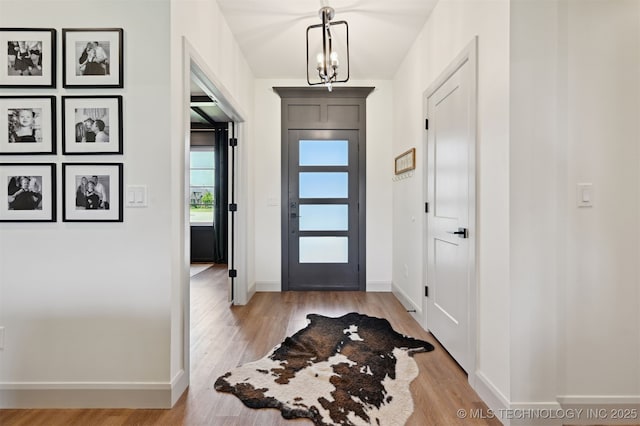 3009 W Van Buren Ct, Broken Arrow, OK 74011 - foyer with light wood finished floors and baseboards