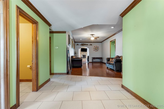 17822 S 44th W Ave, Mounds, OK 74047 - hall featuring ornamental molding, arched walkways, baseboards, light tile patterned floors, and recessed lighting