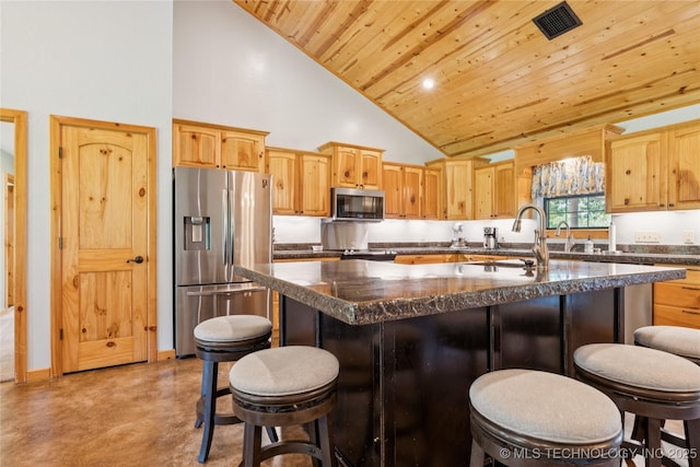 33820 W 261st St S, Bristow, OK 74010 - kitchen featuring appliances with stainless steel finishes, high vaulted ceiling, wood ceiling, a kitchen bar, and a kitchen island with sink