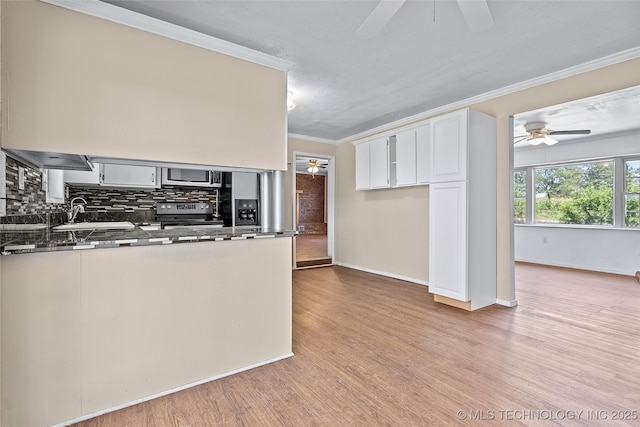 1822 Abner Rd, Overbrook, OK 73453 - kitchen featuring ceiling fan, appliances with stainless steel finishes, decorative backsplash, and crown molding