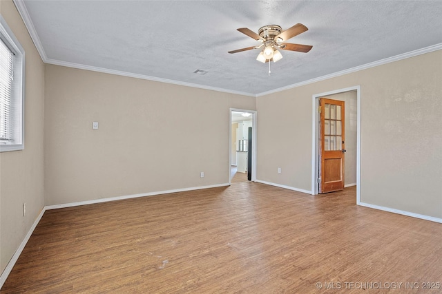 1822 Abner Rd, Overbrook, OK 73453 - spare room featuring wood finished floors, ceiling fan, crown molding, baseboards, and a textured ceiling
