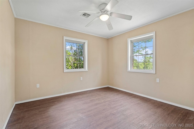 1822 Abner Rd, Overbrook, OK 73453 - spare room with wood finished floors, ornamental molding, ceiling fan, and baseboards