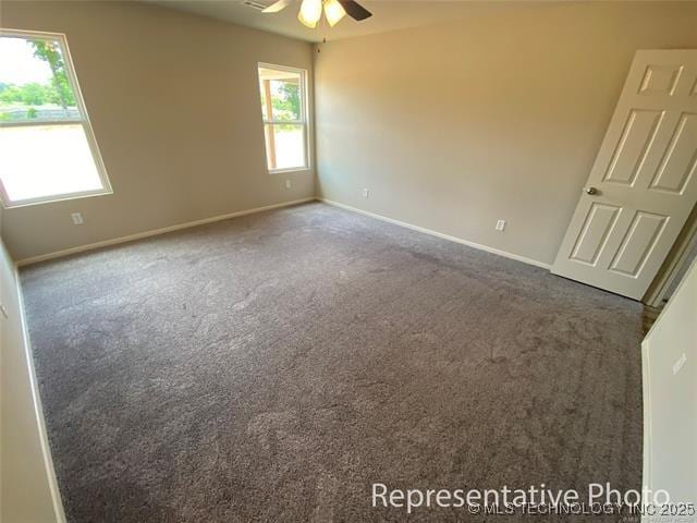 8909 E 164th St S, Bixby, OK 74008 - empty room featuring ceiling fan, carpet floors, and baseboards