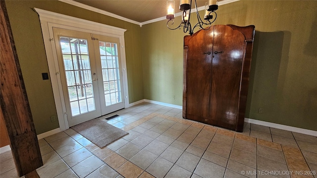 6401 S 86th E Ave, Tulsa, OK 74133 - entryway featuring french doors, ornamental molding, a chandelier, and tile patterned flooring