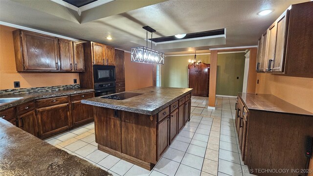 6401 S 86th E Ave, Tulsa, OK 74133 - kitchen featuring black appliances, dark countertops, a chandelier, light tile patterned floors, and decorative light fixtures
