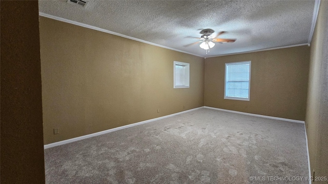 6401 S 86th E Ave, Tulsa, OK 74133 - unfurnished room with crown molding, ceiling fan, carpet floors, and a textured ceiling