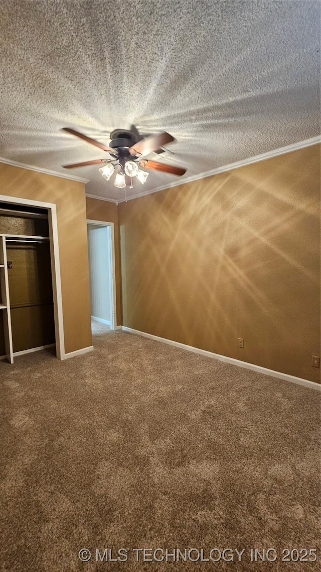6401 S 86th E Ave, Tulsa, OK 74133 - unfurnished bedroom featuring carpet floors, crown molding, a textured ceiling, a ceiling fan, and a closet
