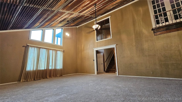 6401 S 86th E Ave, Tulsa, OK 74133 - carpeted empty room featuring a high ceiling and stairs