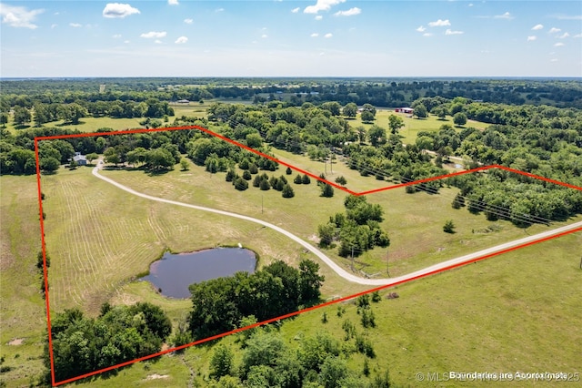 3127 Pleasant Hill Rd, Caddo, OK 74729 - overview of rural landscape with property parcel outlined and a nearby body of water
