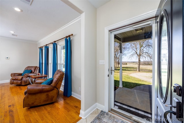 3127 Pleasant Hill Rd, Caddo, OK 74729 - entrance foyer with ornamental molding, baseboards, light wood-style floors, and recessed lighting