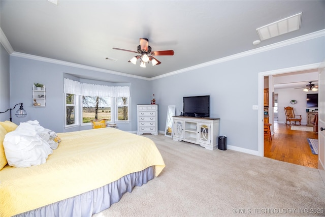 3127 Pleasant Hill Rd, Caddo, OK 74729 - bedroom featuring crown molding, carpet floors, baseboards, and a ceiling fan