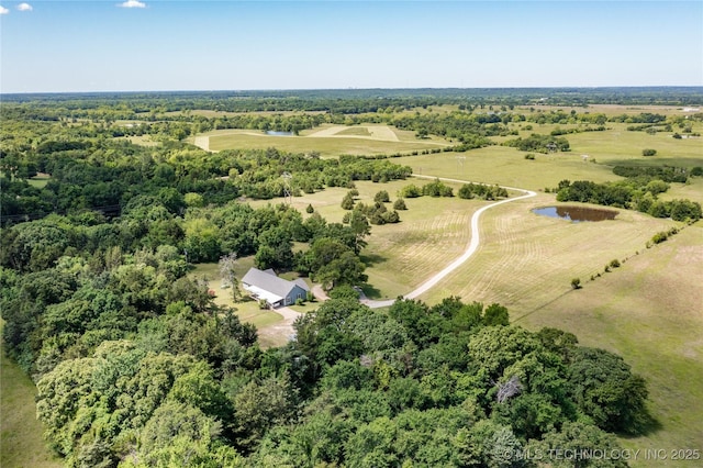 3127 Pleasant Hill Rd, Caddo, OK 74729 - aerial overview of property's location with a forest