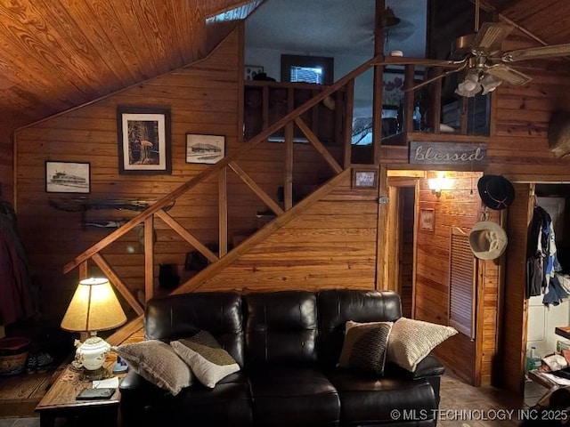 472422 E 754th Rd, Westville, OK 74965 - living area featuring wood walls, vaulted ceiling, wooden ceiling, and ceiling fan